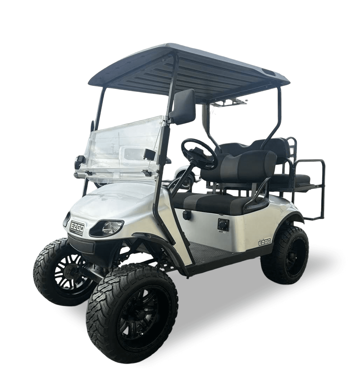 A white golf cart with a roof and seating for two.
